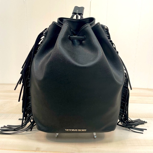 Victoria's Secret Handbags - Victoria’s Secret NWT Black Faux Leather Fringe Drawstring Backpack Vegan